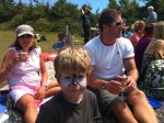 Face painted family at picnic